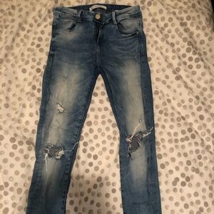Distressed Zara light wash skinny jeans